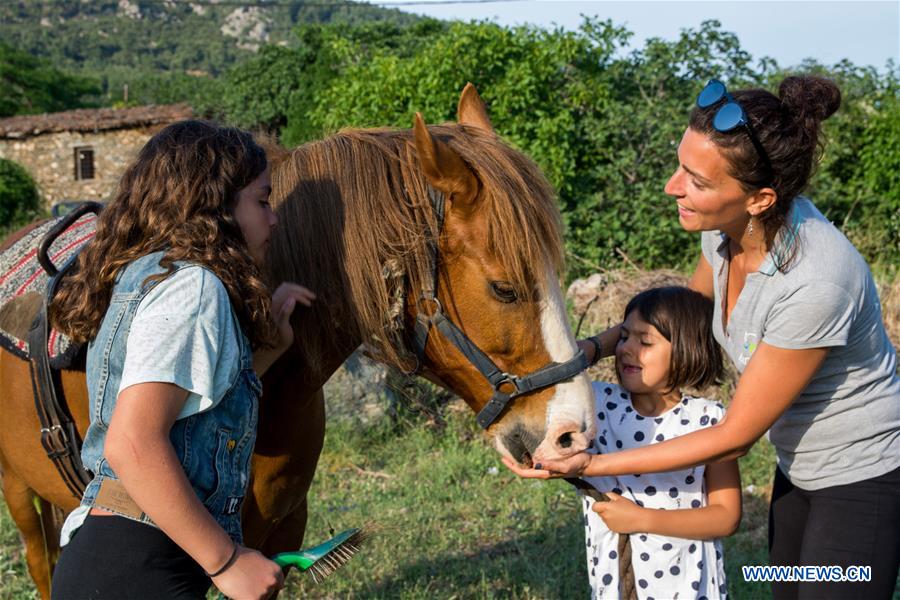 GREECE-LARISSA-HORSE THERAPY-CHILDREN