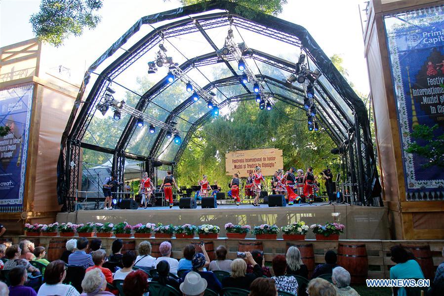 ROMANIA-BUCHAREST-FOLKLORE FESTIVAL-CHINA-YUNNAN-PERFORMANCE