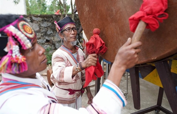 In pics: cultural heritage inheritor dedicated to passing on technique of making Jinuo drums