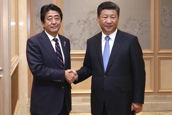 Xi expects China-Japan ties back on normal track