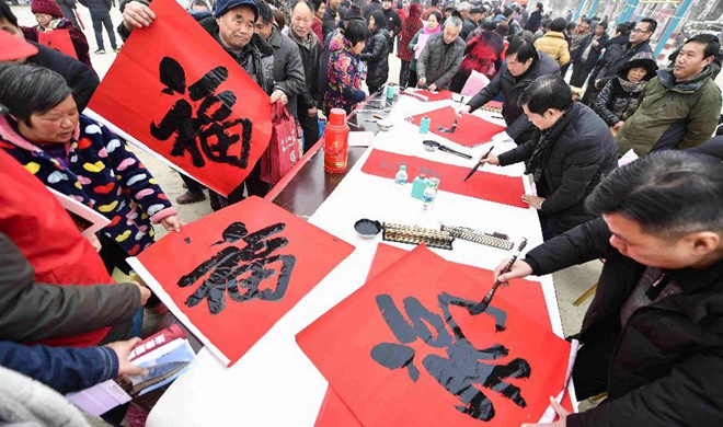 Volunteers serve residents at Wuxiaoge Village in E China's Anhui