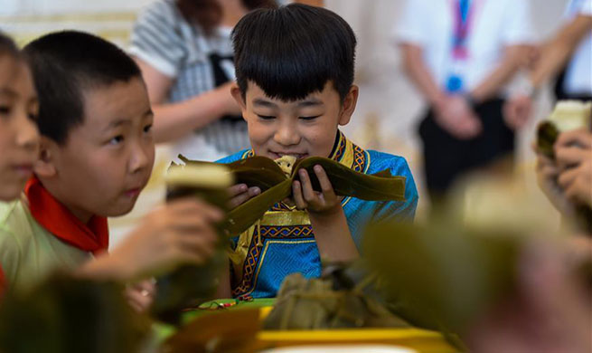 Folk custom activity held to greet Dragon Boat Festival in Hohhot, north China