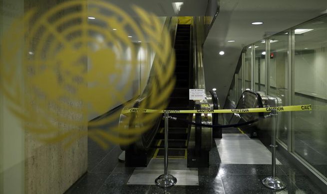 Feature: Escalators, fountain stop functioning -- UN tightening belt to tide over financial crisis