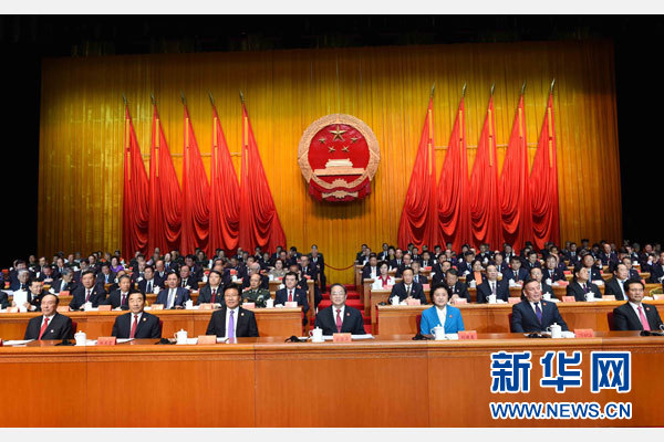 10月1日，慶祝中華人民共和國成立66周年暨新疆維吾爾自治區(qū)成立60周年大會在新疆人民會堂隆重舉行。 新華社記者 饒愛民 攝