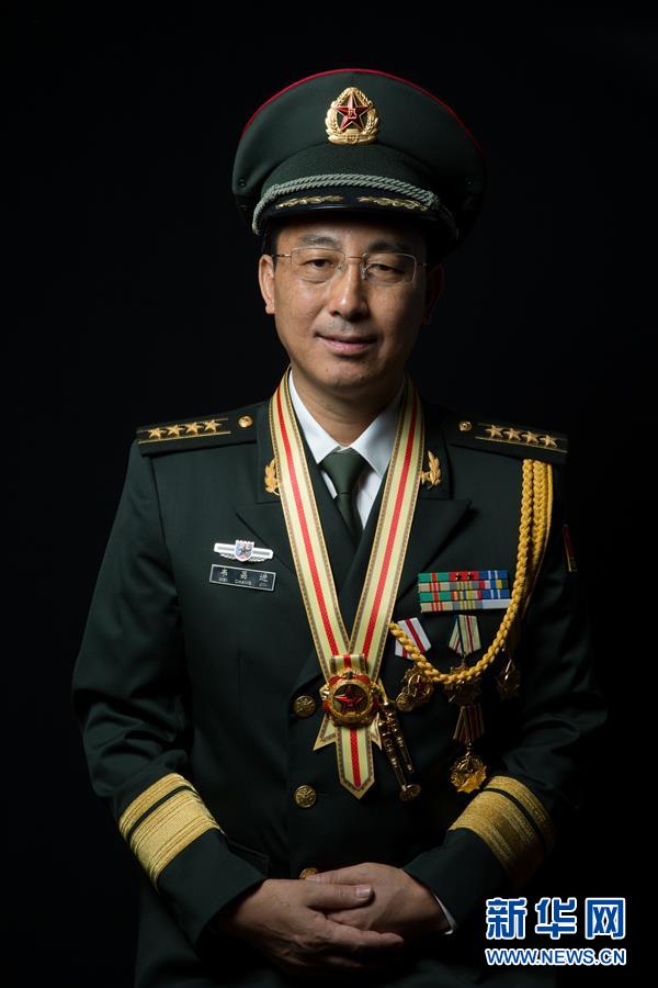 （改革先鋒風(fēng)采&middot;圖文互動(dòng)）戰(zhàn)斗英雄韋昌進(jìn)：甘做鋼鐵長(zhǎng)城一塊磚