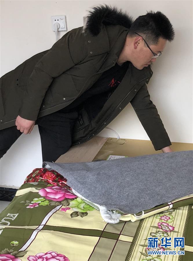 （新春走基層&middot;圖文互動）（3）班彥村&ldquo;冬天最幸福的事&rdquo;：用上&ldquo;電熱炕&rdquo; 告別煤煙味 