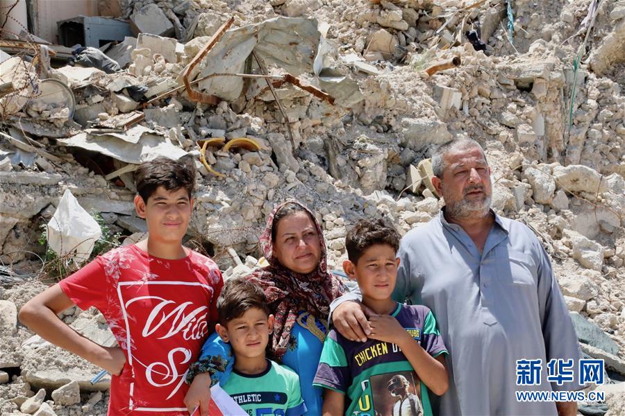 (國(guó)際·圖文互動(dòng))(1)通訊:中企員工愛(ài)心捐款助摩蘇爾老城民眾重燃生活希望