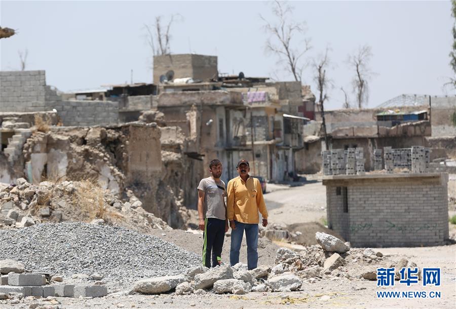 (國際·圖文互動)(2)通訊:中企員工愛心捐款助摩蘇爾老城民眾重燃生活希望