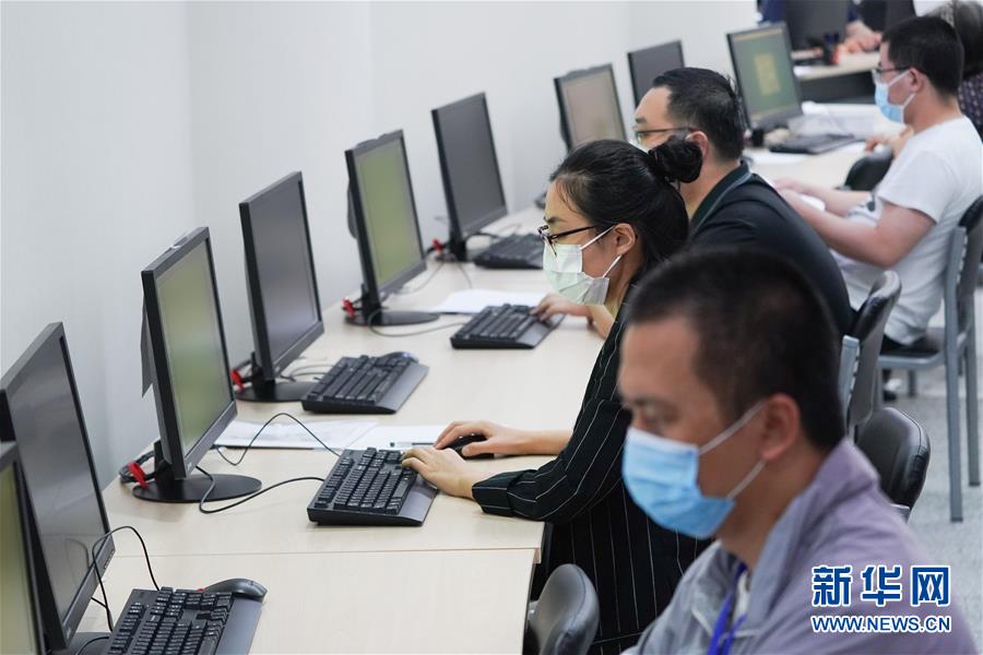 （教育）（1）北京：走進(jìn)高考評卷點(diǎn)