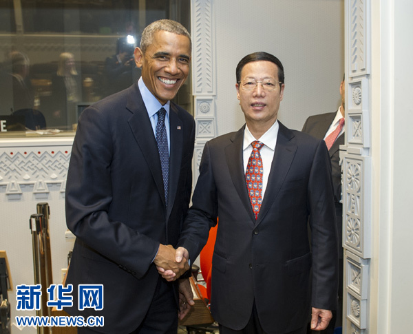 9月23日，國家主席習近平特使、國務院副總理張高麗在紐約會見出席聯(lián)合國氣候峰會的美國總統(tǒng)奧巴馬。 新華社記者王曄攝