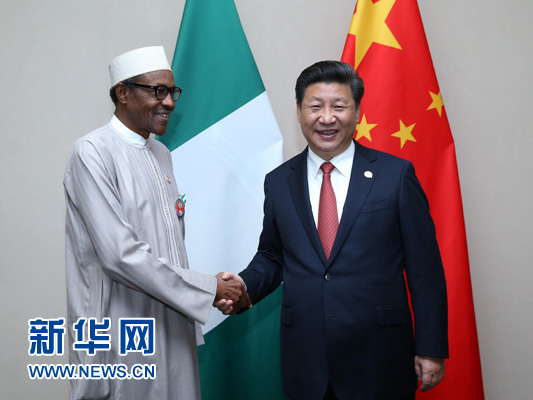 12月4日，國家主席習近平在約翰內(nèi)斯堡會見尼日利亞總統(tǒng)布哈里。 新華社記者 龐興雷 攝 