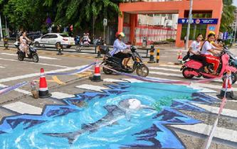 &ldquo;海洋世界&rdquo;3D立體斑馬線亮相?？? />  
<div>“海洋世界”3D立體斑馬線亮相海口</div>
</a> 
</div>
<div   id=